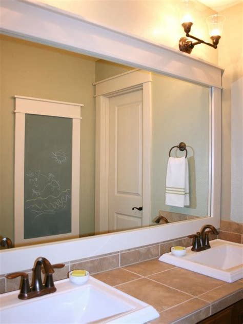 Since our bathroom makeover was pretty budget friendly, we decided to frame the vanity mirrors. How to Frame a Mirror | Large bathroom mirrors, Large ...
