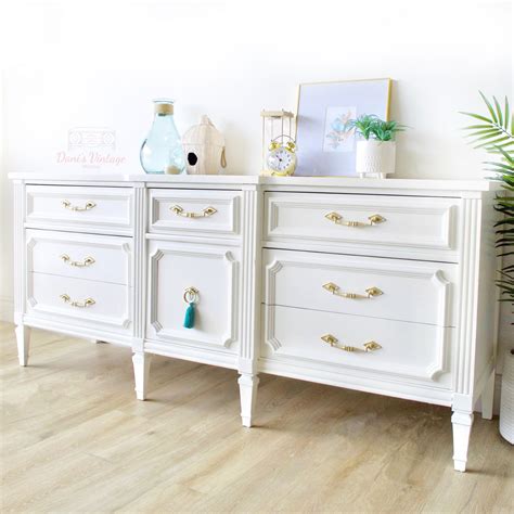Distinguished by its lucite and brass square hardware, we suggest adding the matching nightstand with the same acrylic handles, shown below. Off White with Gold Handles Vintage Credenza / Dresser ...