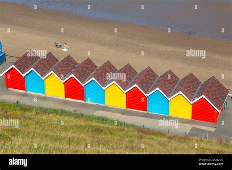 View Of Colourful Beach Huts On West Cliff Beach Whitby North