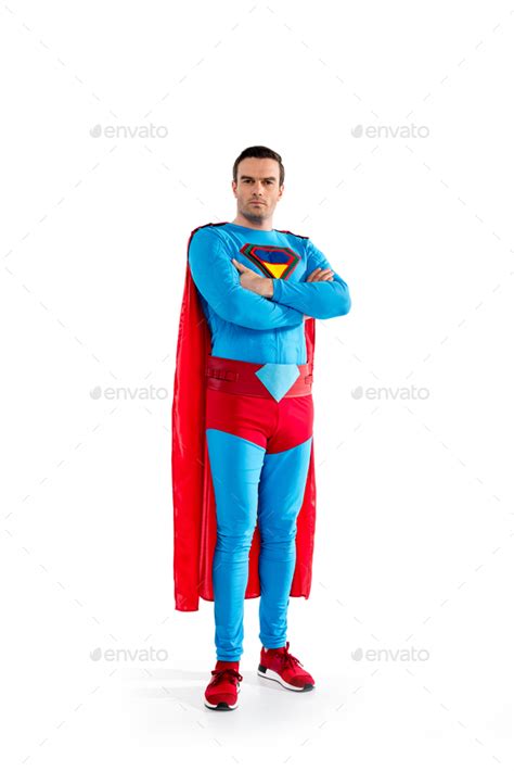 Full Length View Of Confident Handsome Superman Standing With Crossed