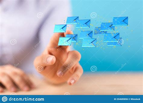 3d Rendered Electronic Mail Hovering In Mans Hand Stock Photo Image