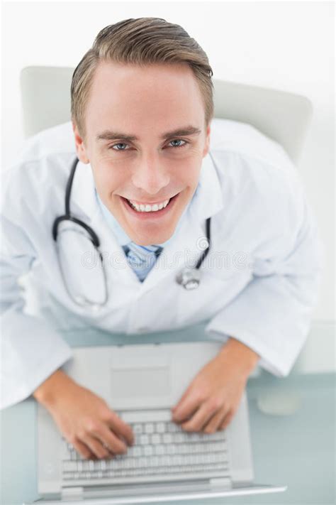 Overhead Portrait Smiling Doctor Using Laptop Stock Photos Free