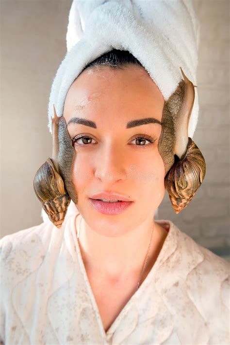 Portrait Of Young Woman With Snails On Her Face Stock Image Image Of