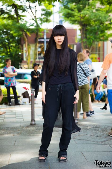 japanese fashion model s all black minimalist fashion and long hair in harajuku tokyo fashion