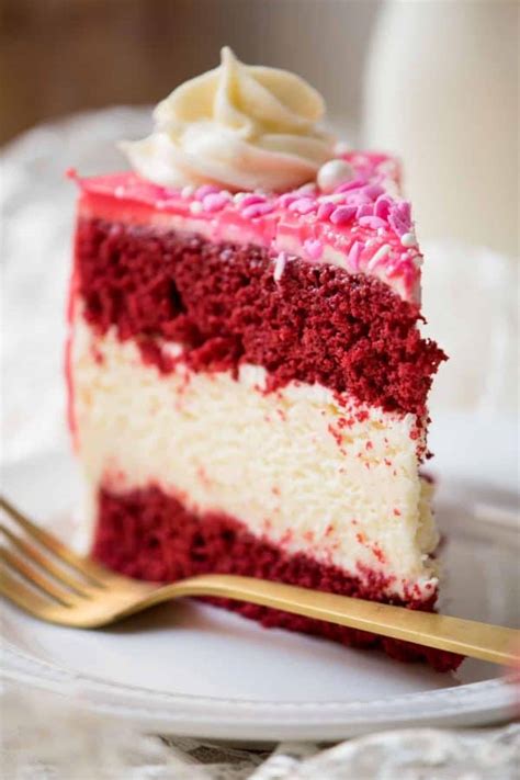 Tender red velvet cake sandwiches creamy cheesecake for the ultimate dessert pairing. Valentine's Day Red Velvet Cheesecake | Hunger|Thirst|Play