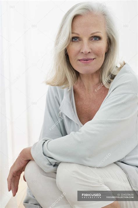 Portrait Of Elegant Senior Woman Smiling At Camera — Looking At Camera