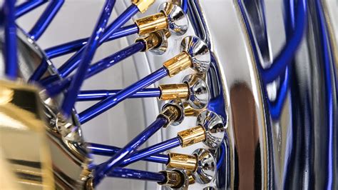 13x7 La Wire Wheels Reverse 72 Spoke Cross Lace Blue Spoke With American Gold Triple Plating