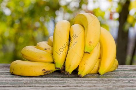 Organic Bananas On A Wooden Table At A Farm Photo Picture And Hd Photos