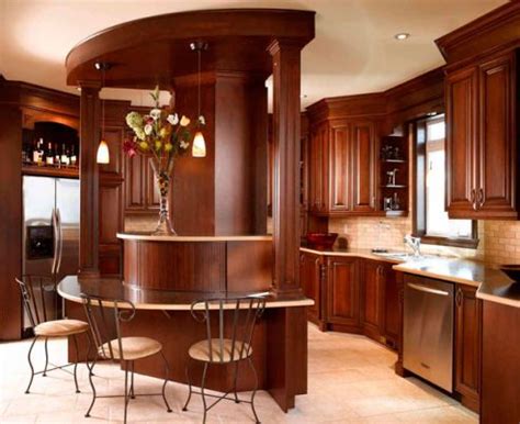 Modern, fitted kitchen with linoleum flooring, cabinets in a dark wood finish, a dining counter island and appliances including a stove and microwave. Cabinets for Kitchen: Dark Brown Kitchen Cabinets Pictures