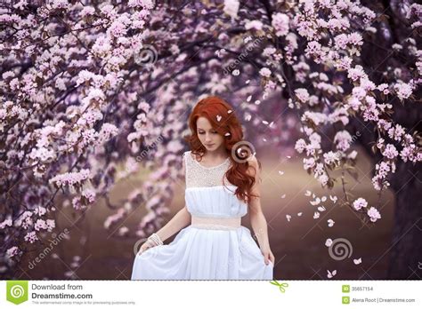 Beautiful Young Woman Under The Flowering Tree Stock Photo Image Of