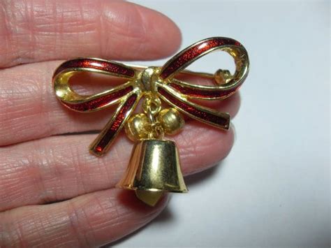 gold tone bow bell brooch holiday bell brooch by gingerslittlegems brooches gold rings bows