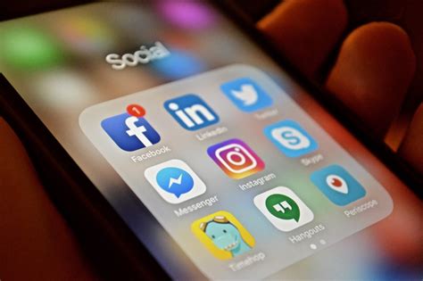 In asking yourself how to create a social media app, you need to make sure that you are building at least the following 3 features: Social Media Icons on an iPhone 7 Screen (Creative Commons ...