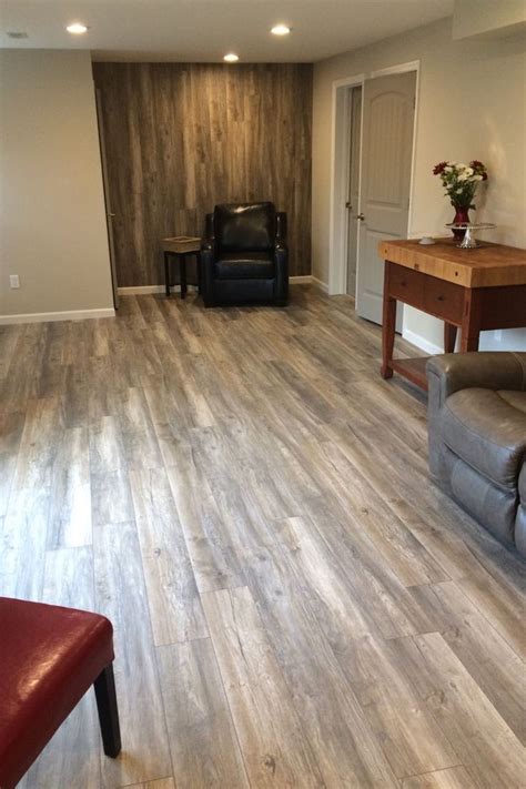 Trafficmaster allure floating vinyl plank flooring can be a great vinyl floor product for bathroom or kitchen flooring when it is installed properly. A beautiful relcaimed Kronotex laminate used on the walls ...