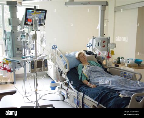 Sick Woman Lying In Hospital Bed Stock Photo Alamy
