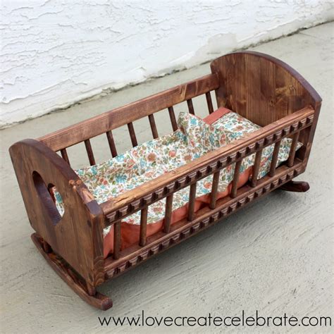 This crib has a gate that drops down allowing easy access to an infant or toddler on a regular basis. Baby Doll's Crib - Love Create Celebrate