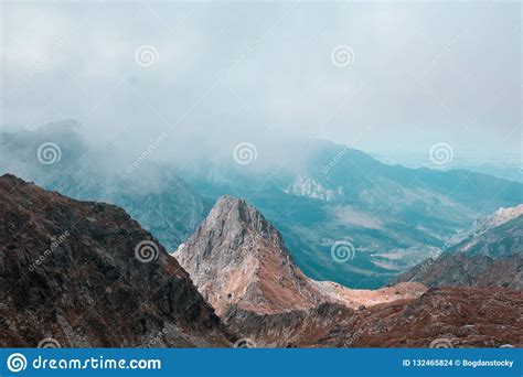 Beautiful Mountain Range Covered With Fog Stock Photo Image Of Hill