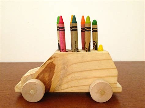 Car With Functional Wheels That Also Serves As Crayon Or Pen Holder