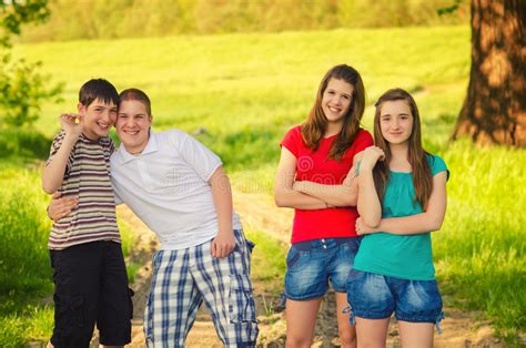 Four Teenage Friends In The Nature Stock Image Image Of Beauty