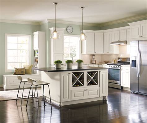 These kitchen cabinets appear to be nailed to the walls. Off White Painted Kitchen Cabinets - Homecrest