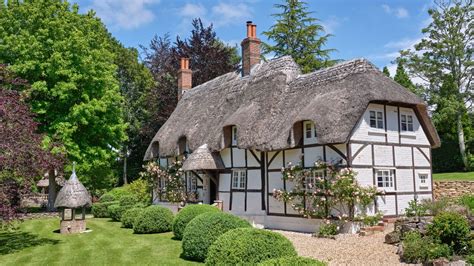 A Fairy Tale Thatched Cottage Updated With A Light And Tranquil