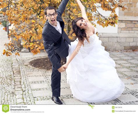 Laughing Wedding Couple In Funny Pose Stock Image Image