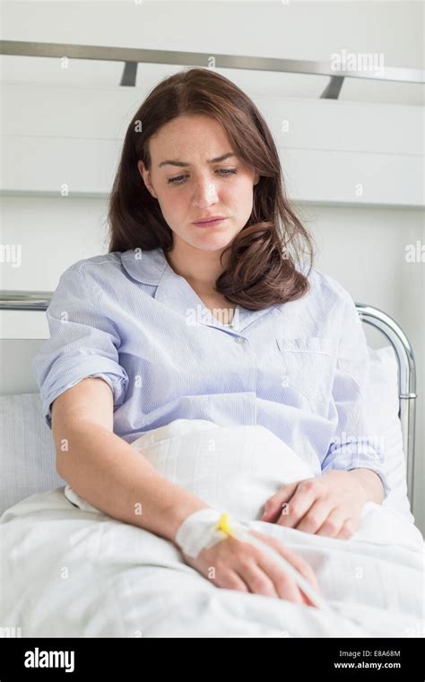Patient In Hospital Lying In Bed Stock Photo Alamy