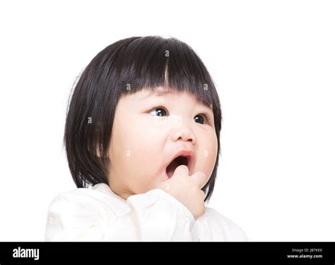 Asian Baby Girl Suck Finger Into Mouth Stock Photo Alamy
