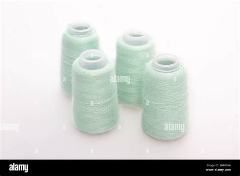 Green Spool Of Thread Isolated On White Background Skein Of Woolen