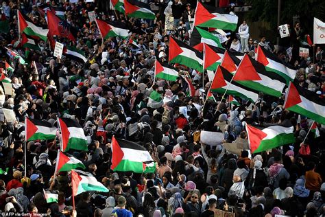 Protesters at a free palestine demonstration in sydney. Sydney flooded with pro-Palestinian protestors during massive demonstration against conflict in ...