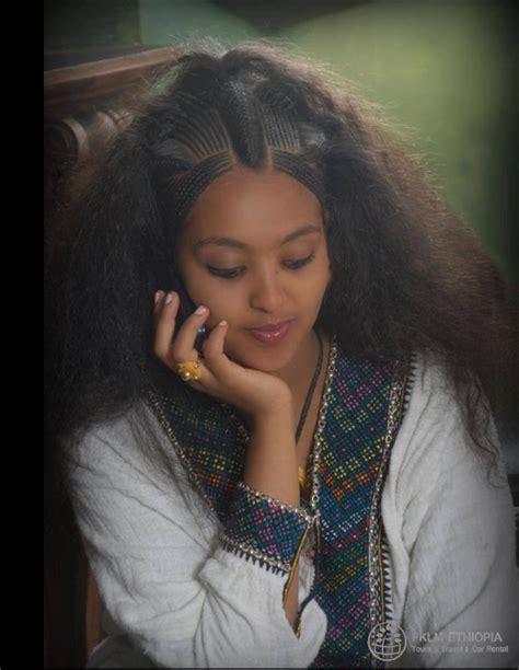 Cute Ethiopian Woman Beautified By Habesha Dress And Hair Dressing