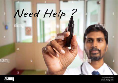 Indian Male Doctor Or Medic Offering Medical Support With Need Help