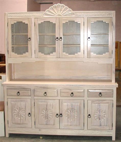 I have pickled oak cabinets that i painted white with and oil based paint and then glazed them with a tea stain. Spanish Colonial Hutches
