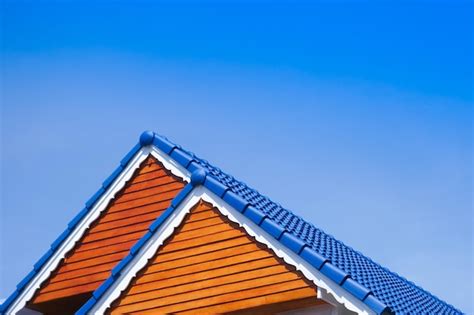 Premium Photo House Blue Roof On Blue Sky Backgroundgeneric View To