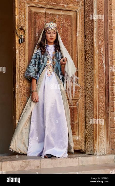 Bride In Traditional Clothes Posing In Front Of Famous Registan Square Samarkand Uzbekistan