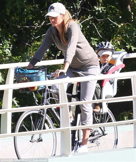 Gisele Bundchen Powers Through On Her Bike As She Tries To Stay In