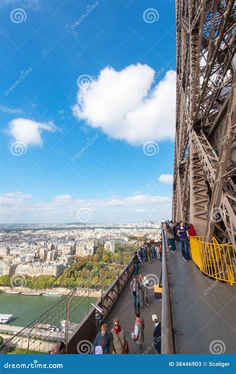 Tourists Are On The Observation Deck Of The Eiffel Tower In Paris