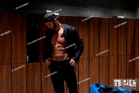 Shirtless Muscular Young Male Athlete In Leather Jacket In Gym Dressing