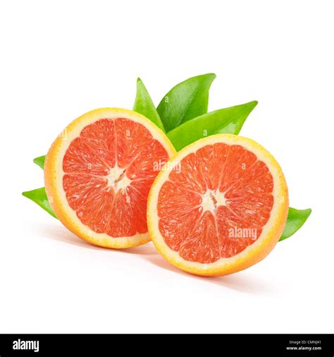 Two Orange Halves With Leaves Isolated On White Stock Photo Alamy