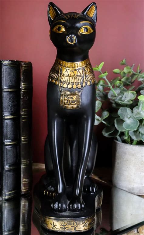 ebros gods and goddesses of egypt black and gold bastet cat sitting in royal pose