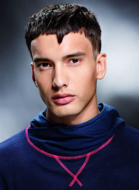 Keeping your hair neat and cared for is very important for the overall impression. Short men's haircut with a triangle on the forehead