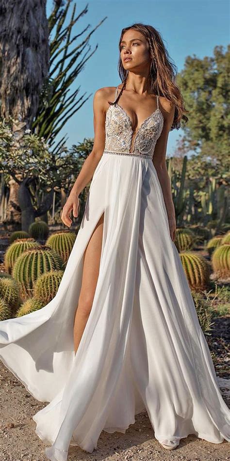Beach Destination Wedding Dresses With Spaghetti Straps Deep V Neckline Slit Asaf Dadush Bridal