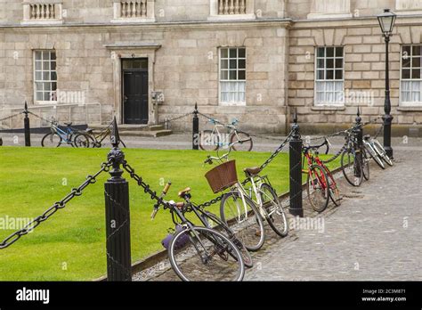 bicycle parking at courtyard trinity college in dublin ireland trinity college campus stock