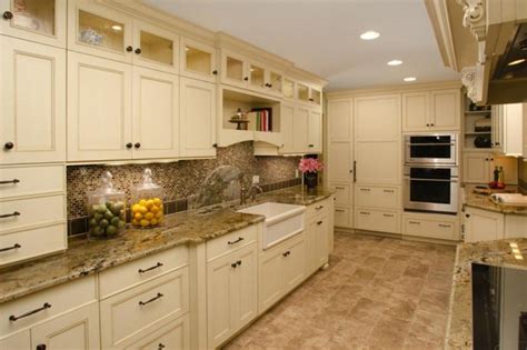 Cream Cabinet Galley Kitchen With Off White Cabinets And Subway Tile