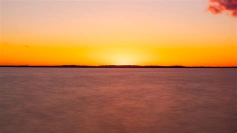 Download Wallpaper 3840x2160 Sea Sunset Horizon Blur Long Exposure
