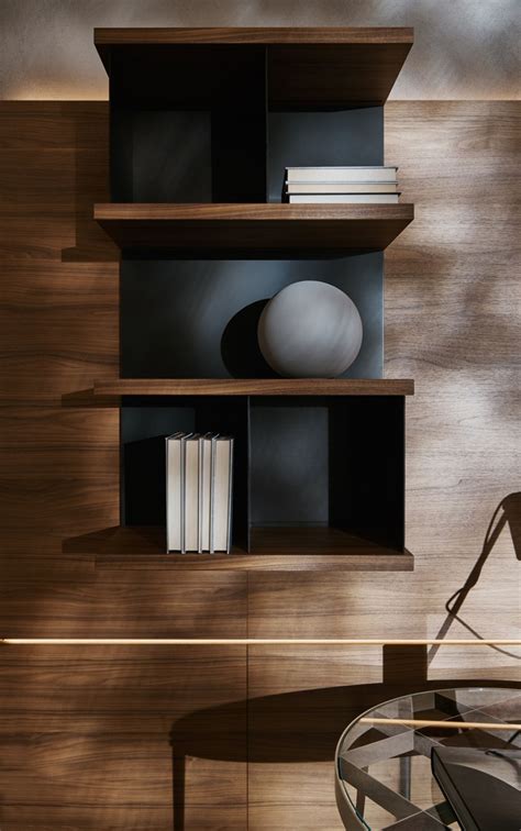 A modular shoulder bookcase system which will add an elegant and functional style to any room in a modern wall bookcase with large, practical open shelves which turn into discreet containers with. Modern modular bookcase, Italian design - Grid - Molteni&C ...