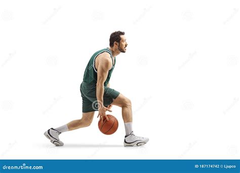 Professional Basketball Player Leading A Ball Between His Legs Stock
