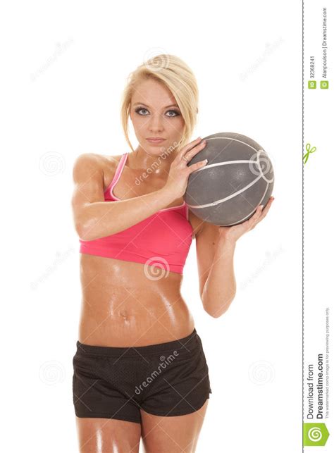 blond woman fitness medicine ball hold by shoulder stock image image of pretty isolated 32368241