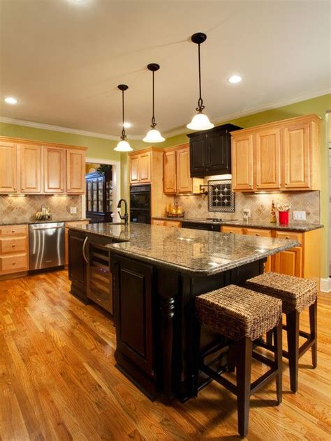 Project 3 another oak kitchen with cathedral style cabinets. cabinet combo: black and light. island shape. black hood ...