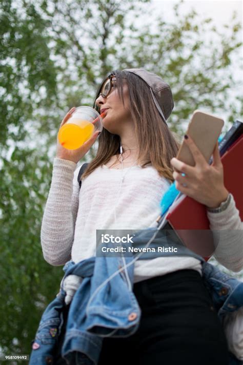 Female College Student With Books Outdoors Stock Photo Download Image