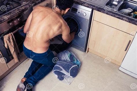 Man Loading His Washing Machine Stock Image Image Of Racial Person 33285285